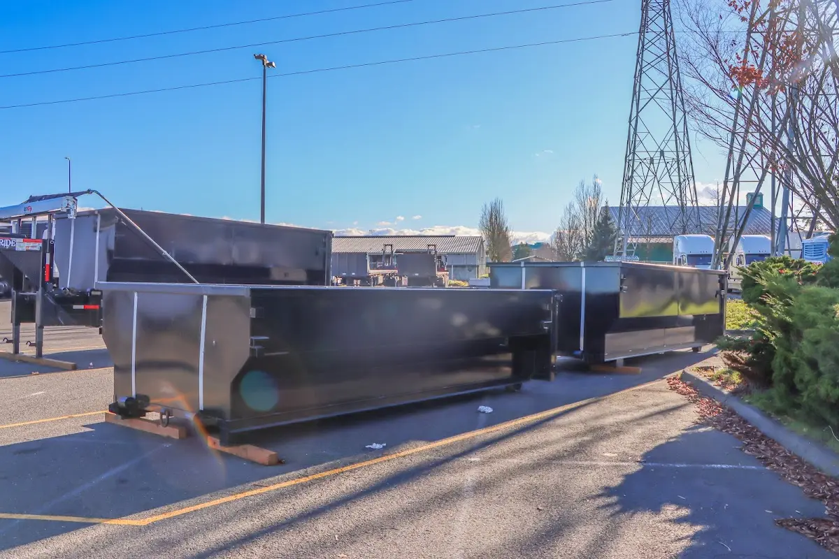 Roll-off dumpster ready for waste disposal at job site for Roofing Dumpster Rental in Fair Haven